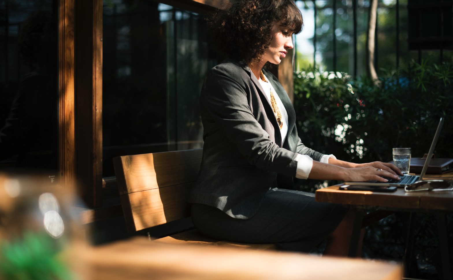 Photo of woman at laptop by RawPixel on Unsplash